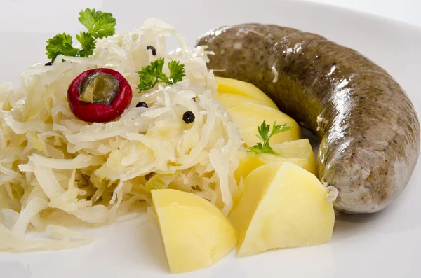 Steamed sauerkraut with home made sausage and potatoes — Stock Photo, Image