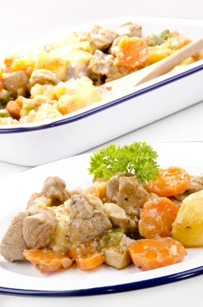 Pork stew with carrots and potatoes — Stock Photo, Image