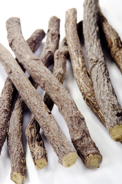Liquorice root lying on a bright surface — Stock Photo, Image