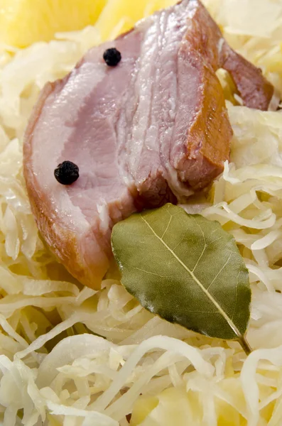 Steamed sauerkraut with smoked pork — Stock Photo, Image