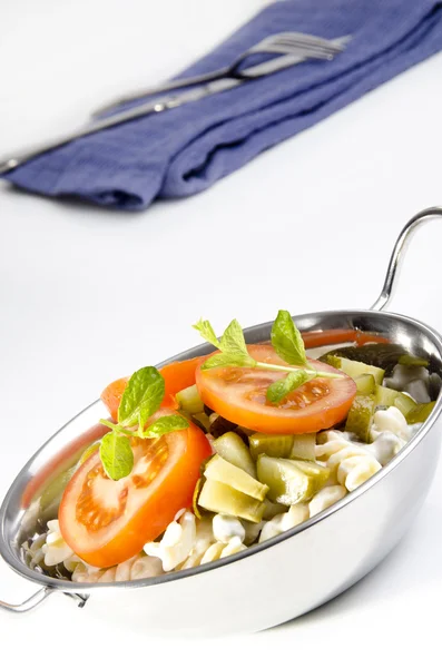 Pasta salad with gherkin and tomato — Stock Photo, Image