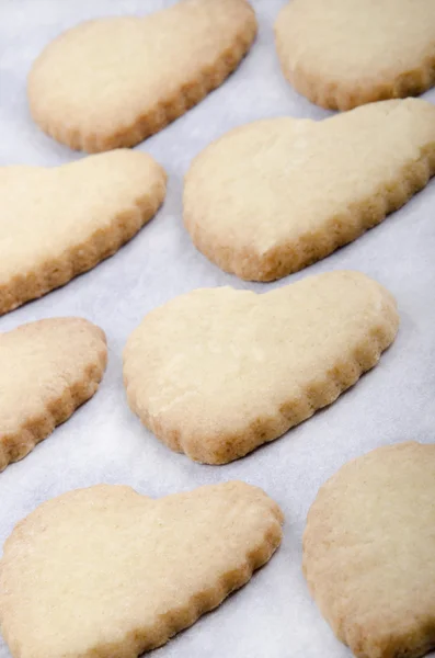 Pastry with cookie cutter with a heart-shape — Stock Photo, Image