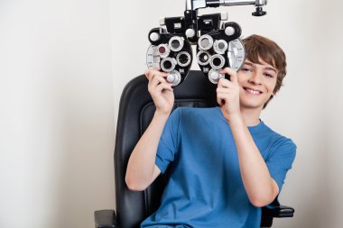 Eye Checkup With Phoropter clipart