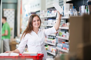 Female Keeping a Box on Shelf clipart