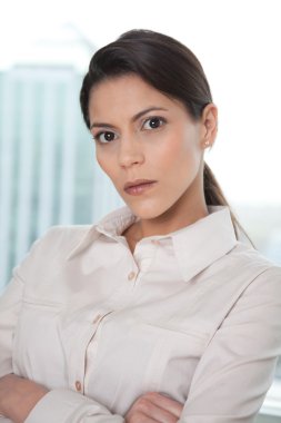 Serious Businesswoman With Arms Crossed clipart