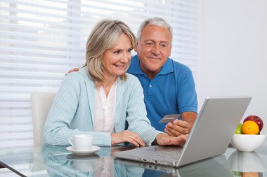 Couple Shopping Online clipart