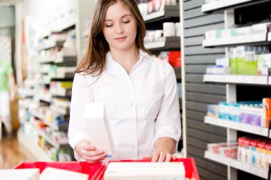 Pharmacist with Drug Product clipart