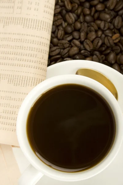Kofeiny napój idealna gazeta — Zdjęcie stockowe
