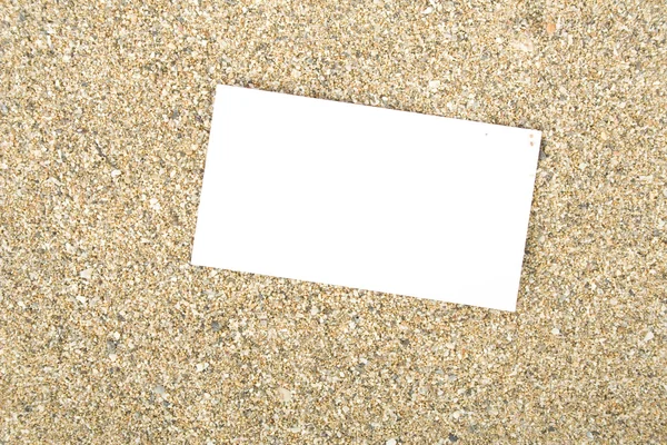 Visitkort på sand — Stockfoto