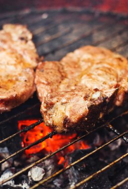 Pork chops on a grill clipart