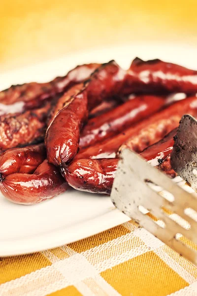 Grilled sausage served on a plate — Stock Photo, Image