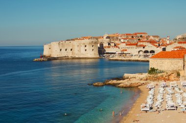 Dubrovnik beach at sunrise clipart