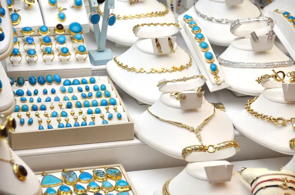 Golded jewel with turquoise — Stock Photo, Image