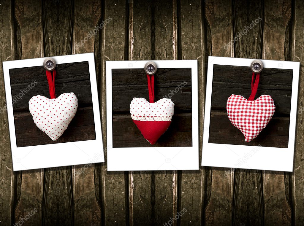Three heart on the wood background