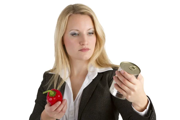 Woman Comparing Fresh To Tinned Vegetables — Stock Photo, Image