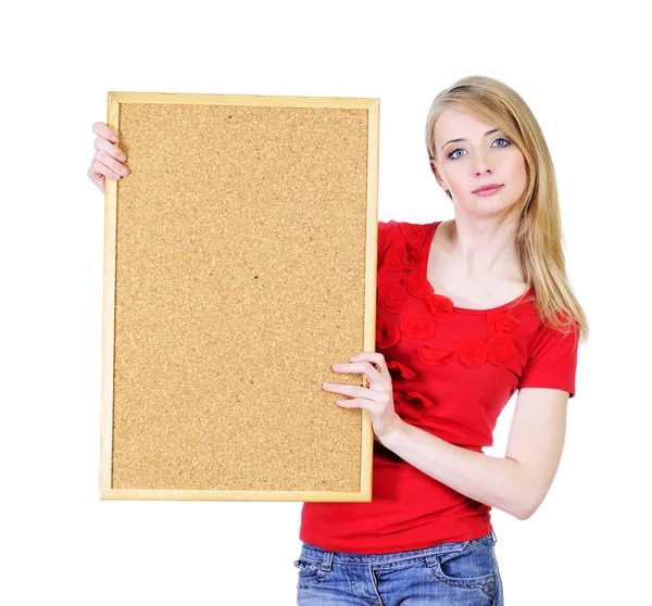 Young blond woman holding a cork board — Stock Photo, Image