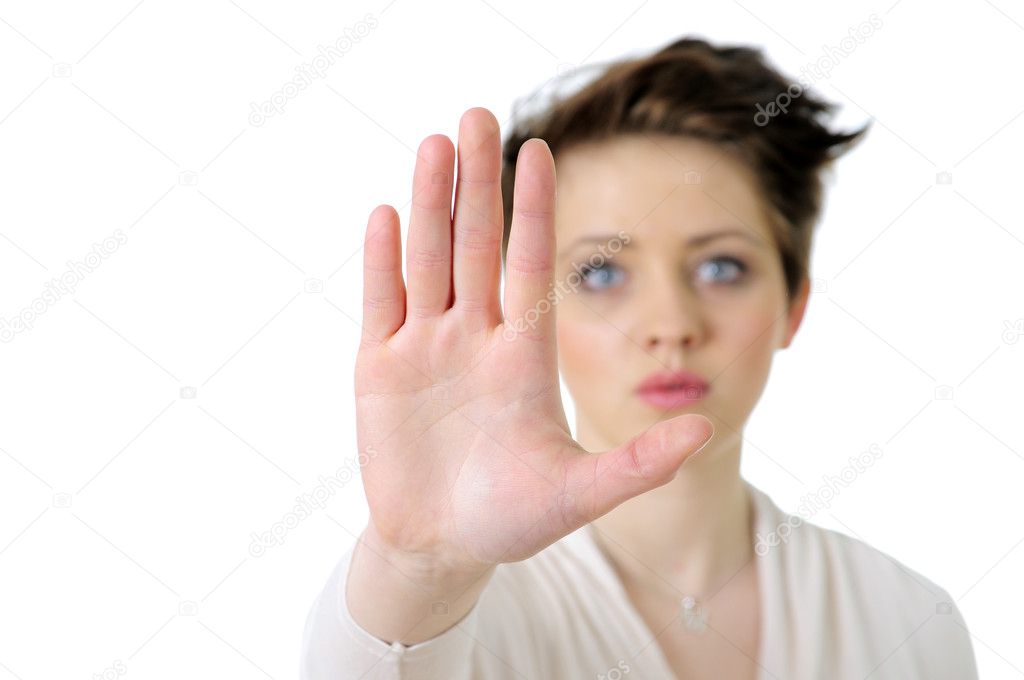 Picture of young woman making stop gesture