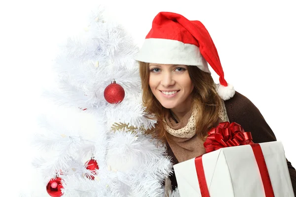 Christmas - vrouw in Kerstman hoed met geschenkdozen — Stockfoto
