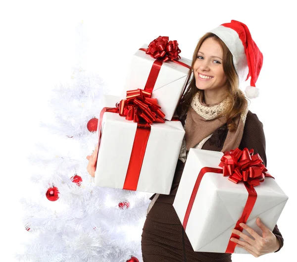 Smiling woman with gift and Christmas tree isolated — Stock Photo, Image