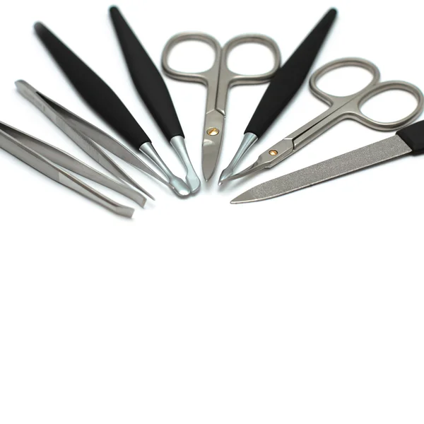 Manicure tools geïsoleerd op wit - apparatuur van de salon van de schoonheid — Stockfoto