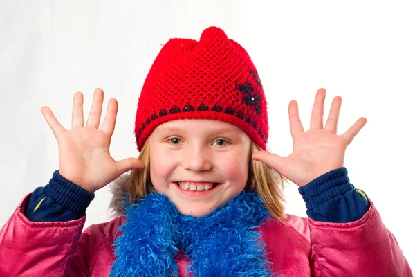 Bella gioiosa bambina vestita vestiti invernali isolato sopra w — Foto Stock