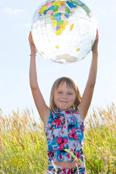 stock image Happy girl with big globe