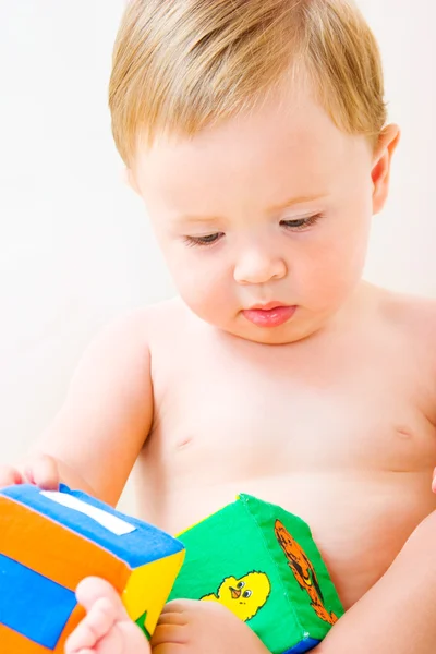 Cute little boy with cubes toy — Stock Photo, Image