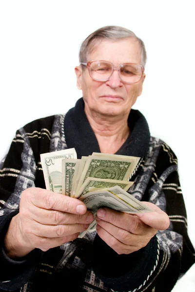 Velho feliz segurando dólares — Fotografia de Stock
