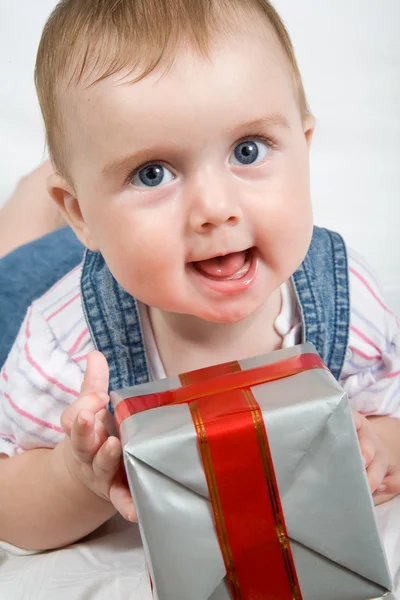 Reaching for gift box — Stock Photo, Image