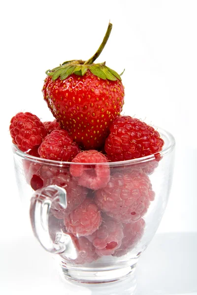 Raspberries in glass cup — Stock Photo, Image