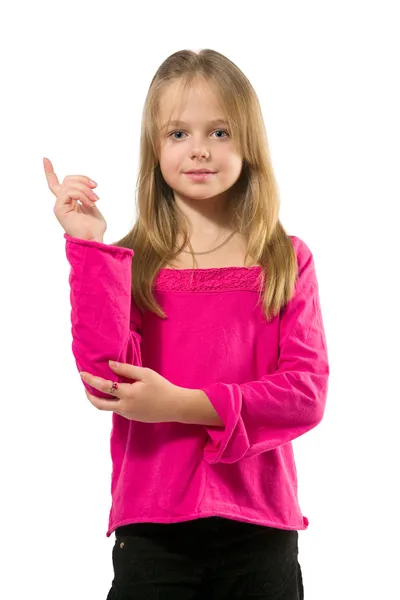 Adorable niña sosteniendo el dedo índice hacia arriba —  Fotos de Stock
