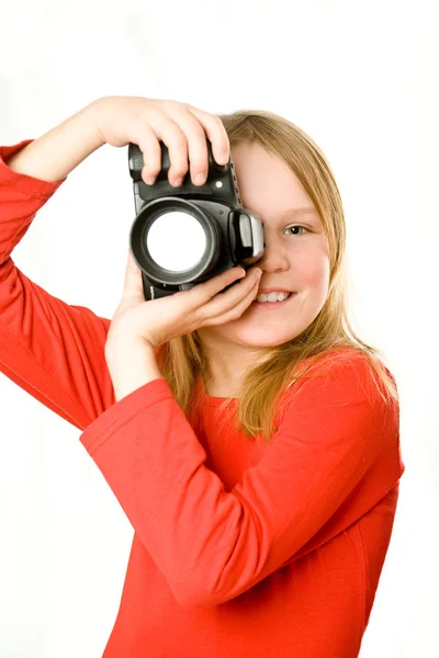 Гарненька дівчинка з фотоапаратом — стокове фото