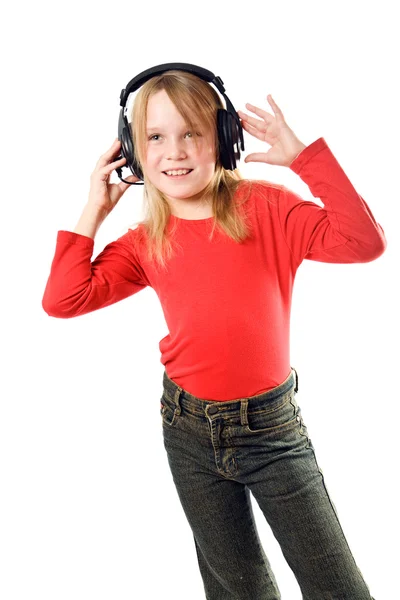 Menina feliz bonita com fones de ouvido — Fotografia de Stock