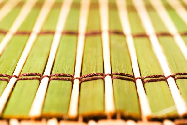 Tapete de bambu close-up fundo — Fotografia de Stock