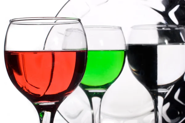 Gläser mit mehrfarbigen Flüssigkeiten — Stockfoto