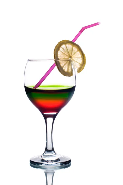 Rainbow färgad dricka med sugrör och citron — Stockfoto