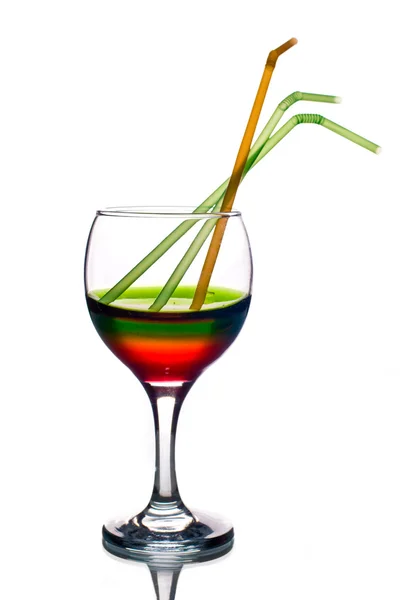 Duha barevné nápoj s brčka — Stock fotografie