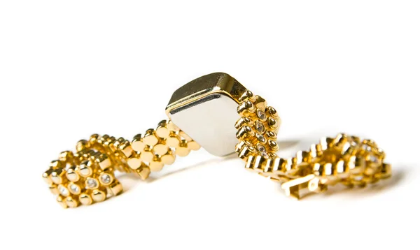 Золотий наручний годинник з дорогоцінними каменями — стокове фото