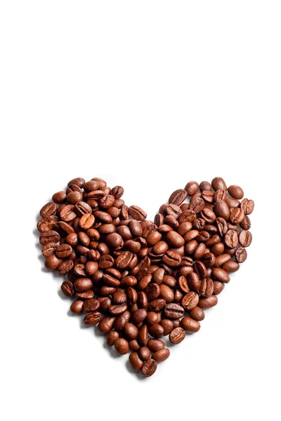 Кофейные зерна в форме сердца — стоковое фото