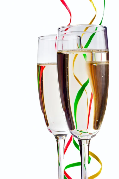 Flute Champagne glasses with paper streamers — Stock Photo, Image