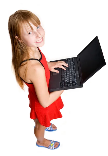Гарненька дівчинка-підліток з ноутбуком ізольована на білому — стокове фото