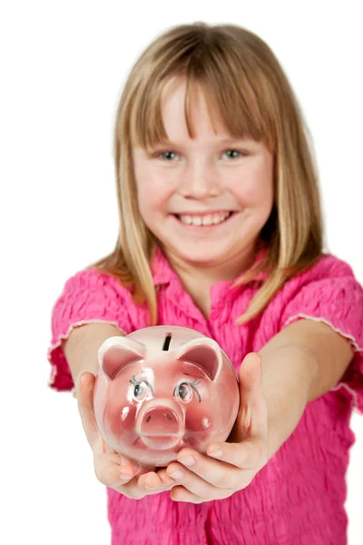 Little girl gazdaság malacka bank — Stock Fotó