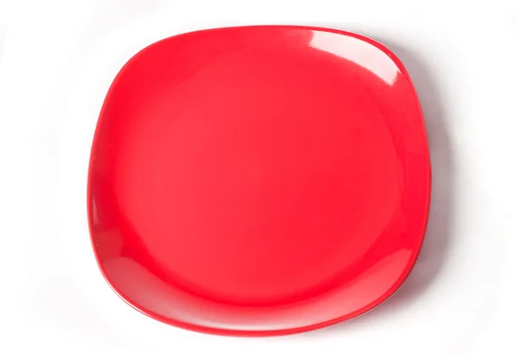Czerwona płyta izolowana na białym tle — Zdjęcie stockowe