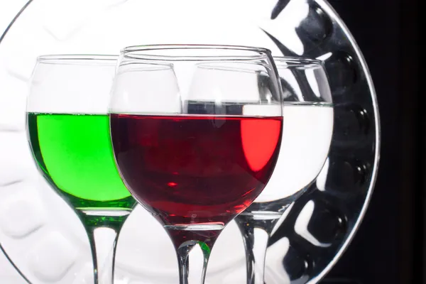 Bicchieri con liquidi multicolori — Foto Stock