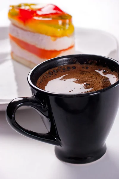 Gâteau avec tasse de café — Photo