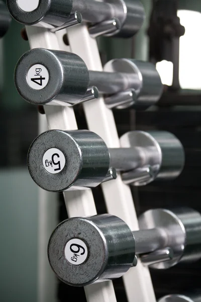 Chrome dumbbells in a row — Stock Photo, Image