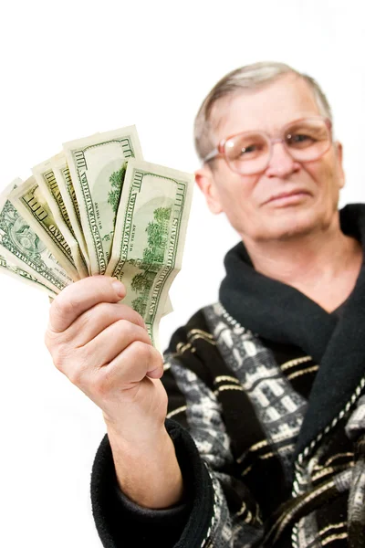 Счастливый старик держит доллары — стоковое фото