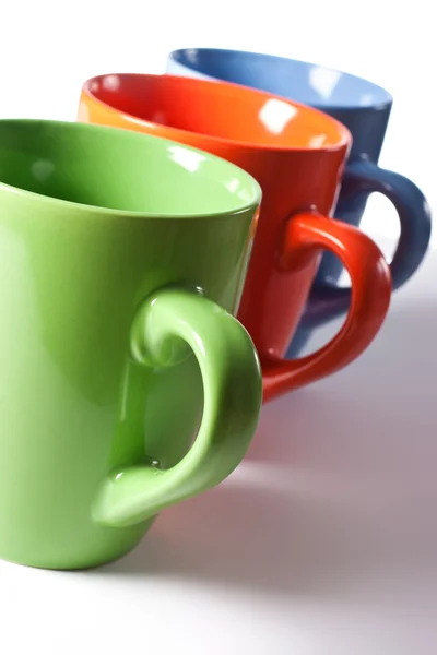 Multicolored ceramic mugs Stock Photo