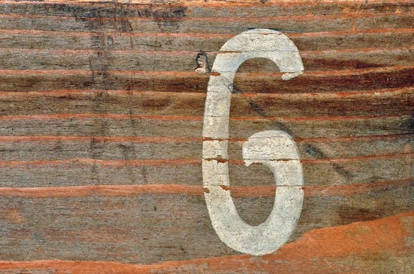 Номер шесть деревянный фон — стоковое фото