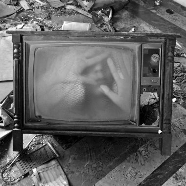 Ghostly figure on vintage tv set clipart